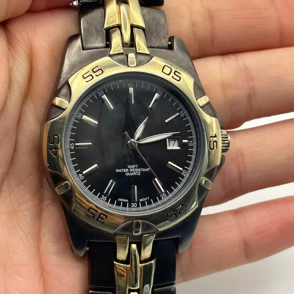Men’s Gold and Black Stainless Steel Men’s Watch Working New Battery